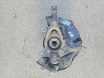 Передний правый кулак поворотный Toyota Corolla E210 48060-02320 на столе осмотра